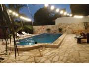 Vendo propiedad en Ñemby con patio y piscina 188,000 USD