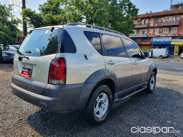 Ssangyong Rexton 2003 — foto 6
