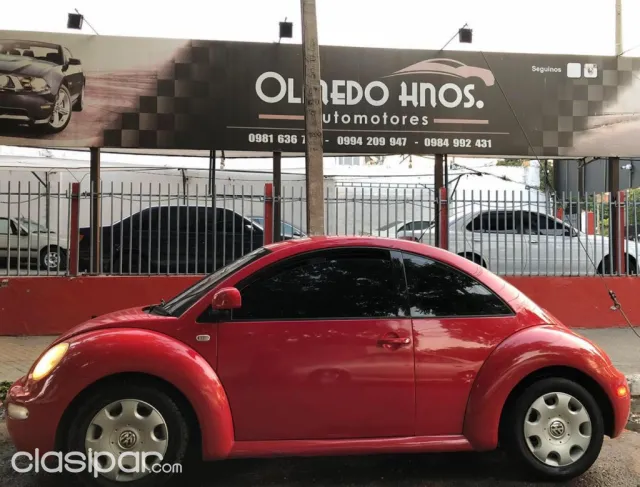 Volkswagen New Beetle 2001 — foto 3