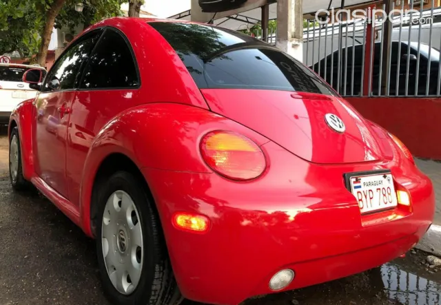 Volkswagen New Beetle 2001 — foto 4