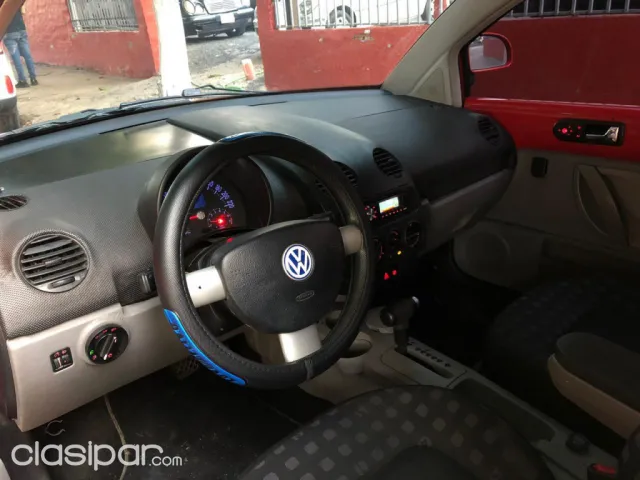 Volkswagen New Beetle 2001 — foto 7