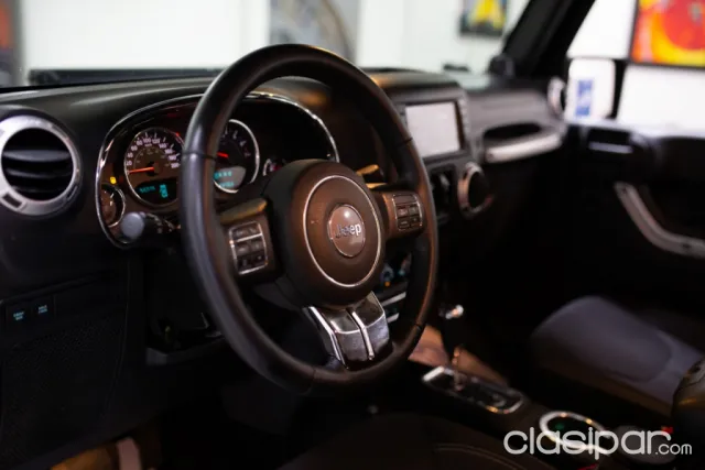 Jeep Wrangler 2013 — foto 7