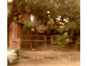 VENDO TERRENO CON CASA ZONA CURVA DE LA MUERTE