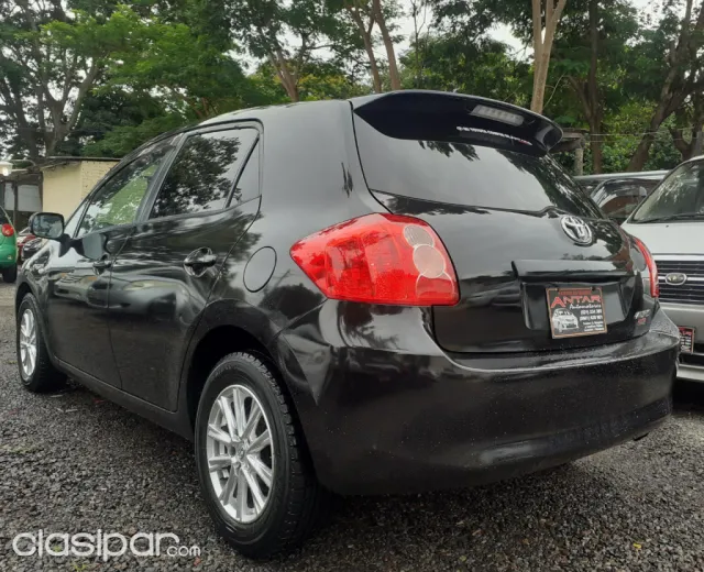 Toyota Auris 2006 — foto 7