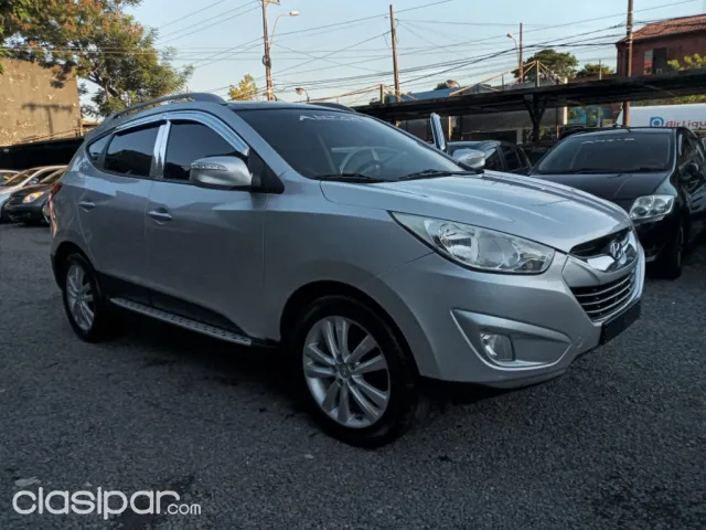 Hyundai Tucson 2011 — foto 2