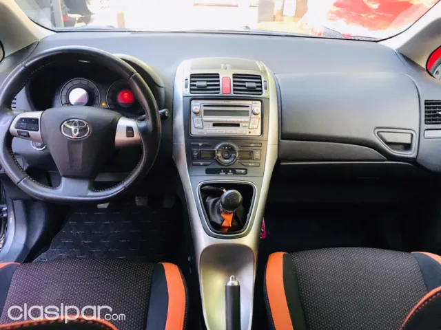 Toyota Auris 2011 — foto 7