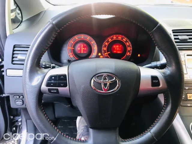 Toyota Auris 2011 — foto 8