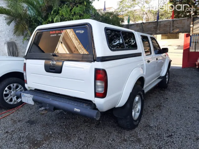 Nissan Frontier 2005 — foto 4