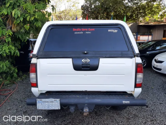 Nissan Frontier 2005 — foto 7
