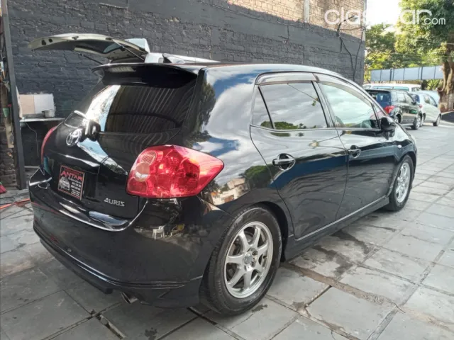 Toyota Auris 2008 — foto 7