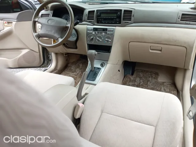 Toyota Corolla 2004 — foto 6