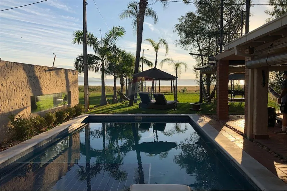 VENDO HERMOSA CASA EN SANBER FRENTE AL LAGO 490,000 USD — foto 2