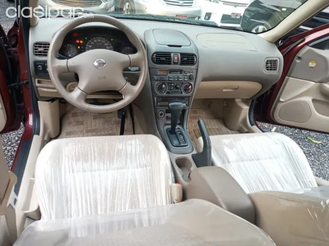 Toyota Nissan Sunny 2004 — foto 6