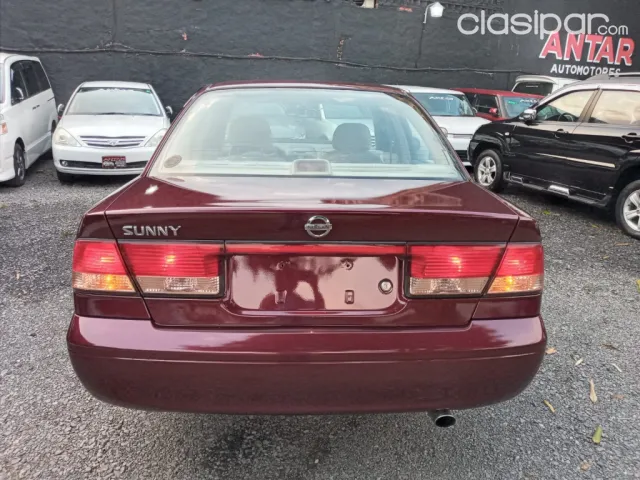 Toyota Nissan Sunny 2004 — foto 7