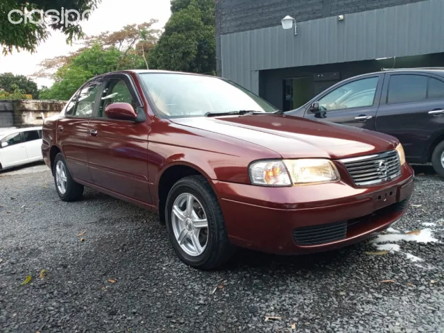 Toyota Nissan Sunny 2004 — foto 8