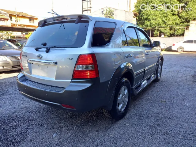 Kia Sorento 2006 — foto 7