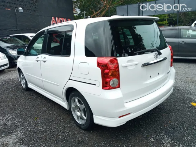 Toyota Raum 2004 — foto 7