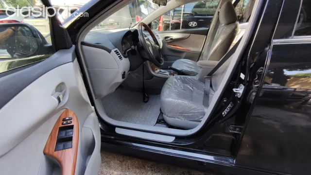 Toyota Axio 2010 — foto 5
