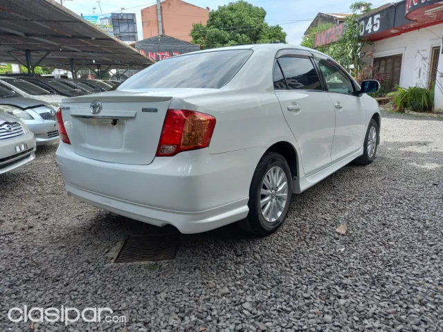 Toyota Axio 2007 — foto 6