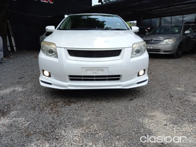 Toyota Axio 2007 — foto 3