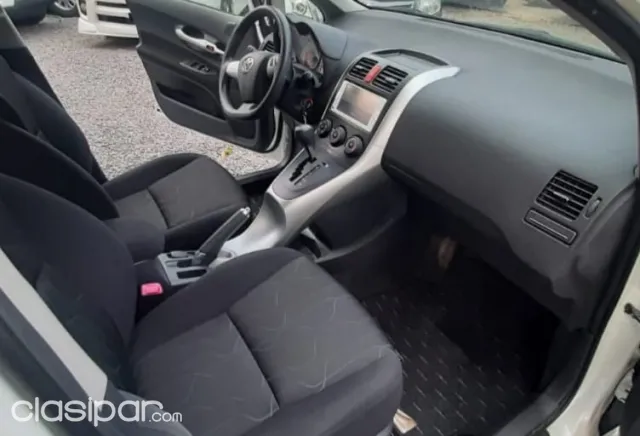 Toyota Auris 2009 — foto 3