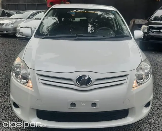 Toyota Auris 2009 — foto 6