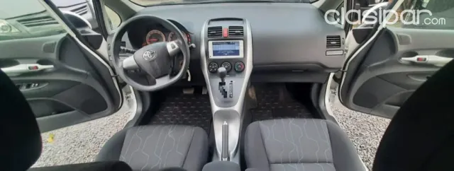 Toyota Auris 2009 — foto 7