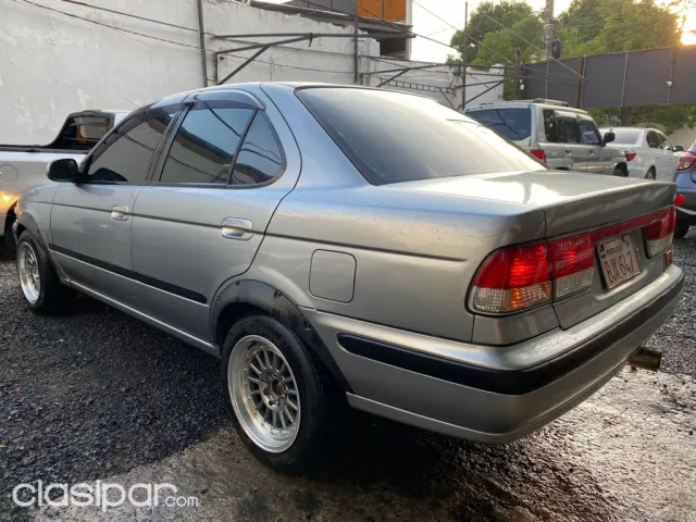 Nissan Sunny 2001 — foto 7