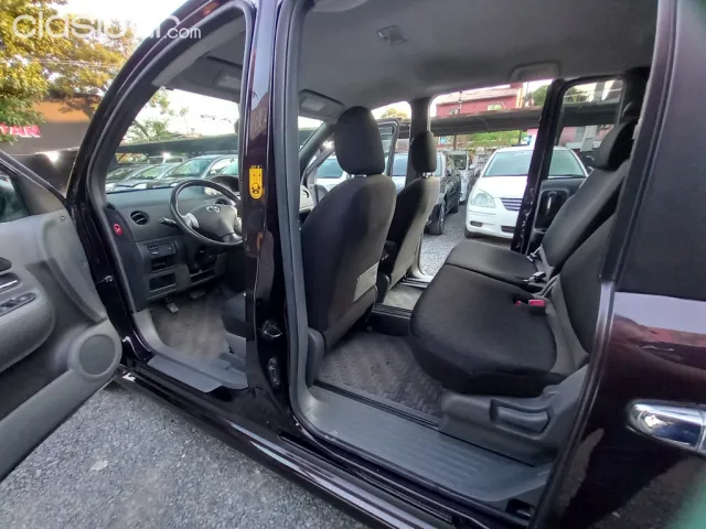 Toyota Sienta 2011 — foto 8