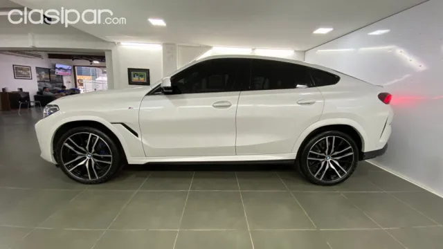 Bmw X6 2021 — foto 7