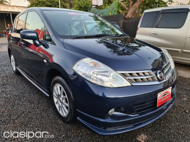Nissan Tiida 2010 — foto 3