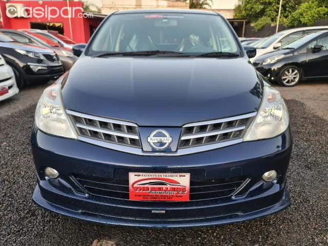 Nissan Tiida 2010 — foto 4