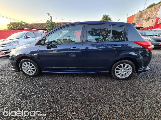 Nissan Tiida 2010 — foto 5