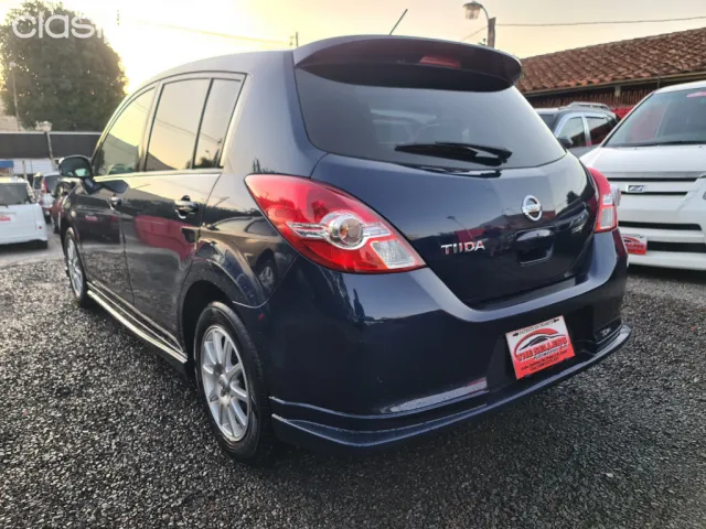Nissan Tiida 2010 — foto 6