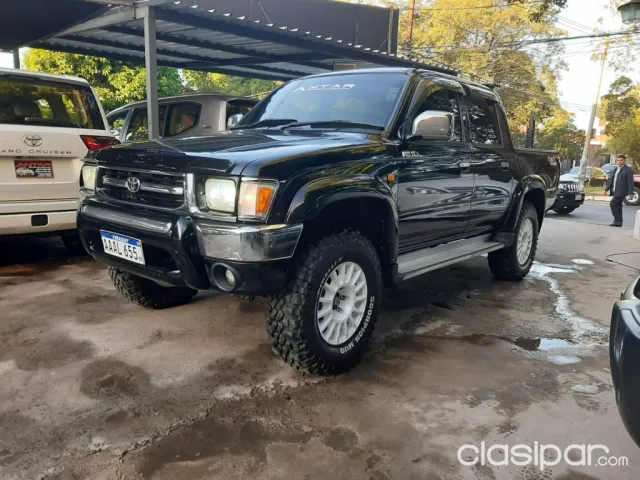 Toyota Hilux 1997 — foto 3