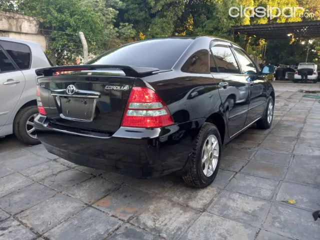 Toyota Corolla 2003 — foto 7