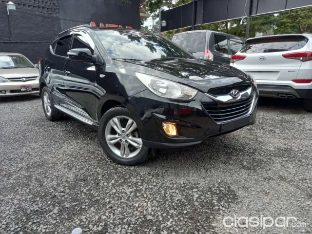 Hyundai Tucson 2011 — foto 2