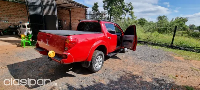 Mitsubishi L 200 2013 — foto 4