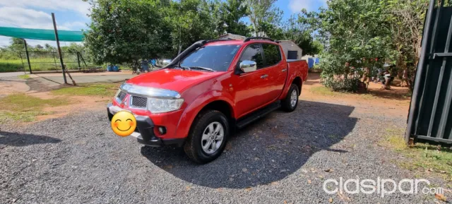 Mitsubishi L 200 2013 — foto 5
