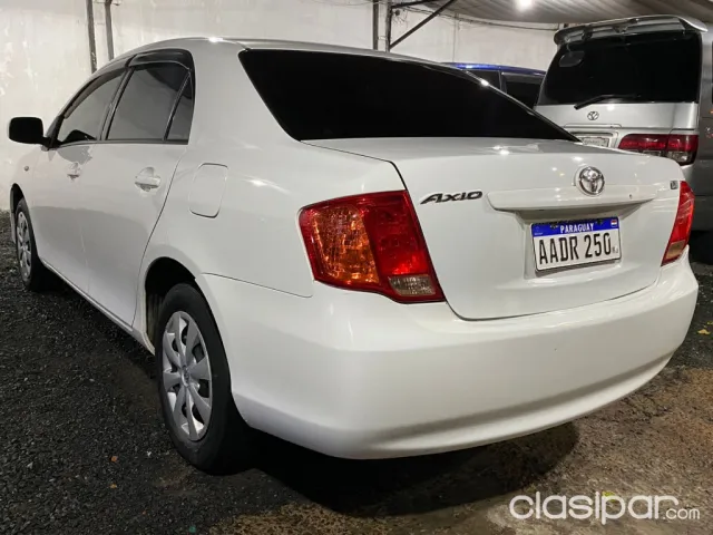 Toyota Axio 2010 — foto 5