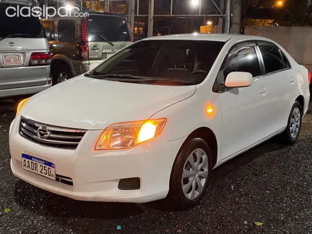 Toyota Axio 2010 — foto 6