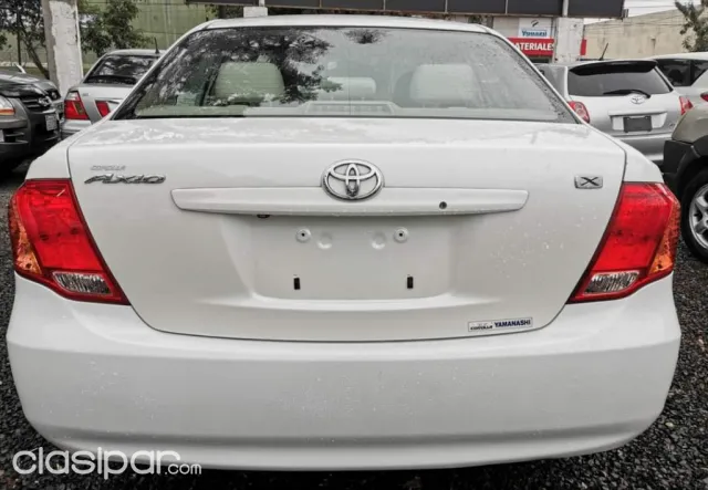 Toyota Axio 2008 — foto 7