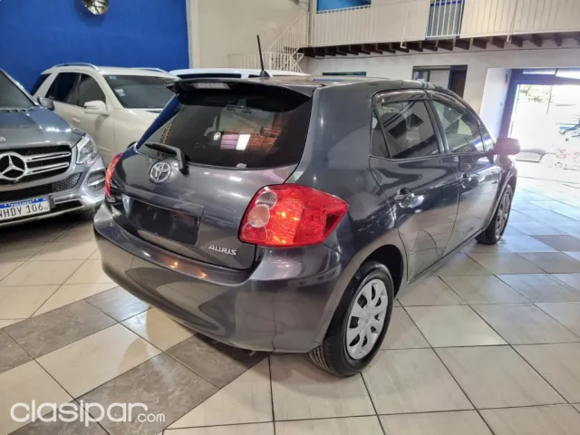 Toyota Auris 2009 — foto 6