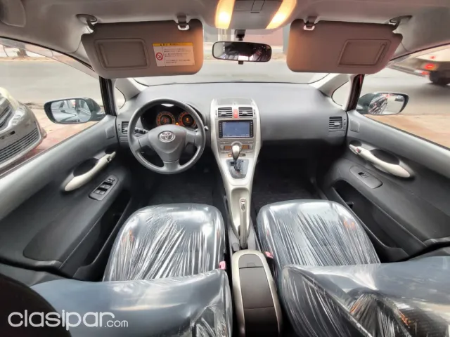 Toyota Auris 2009 — foto 5