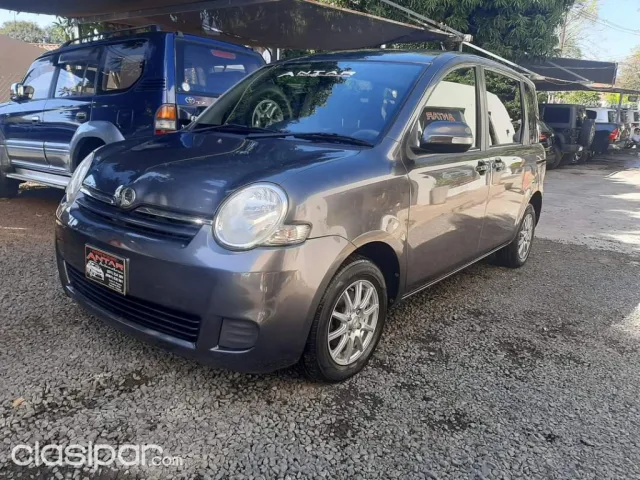 Toyota Sienta 2009 — foto 4