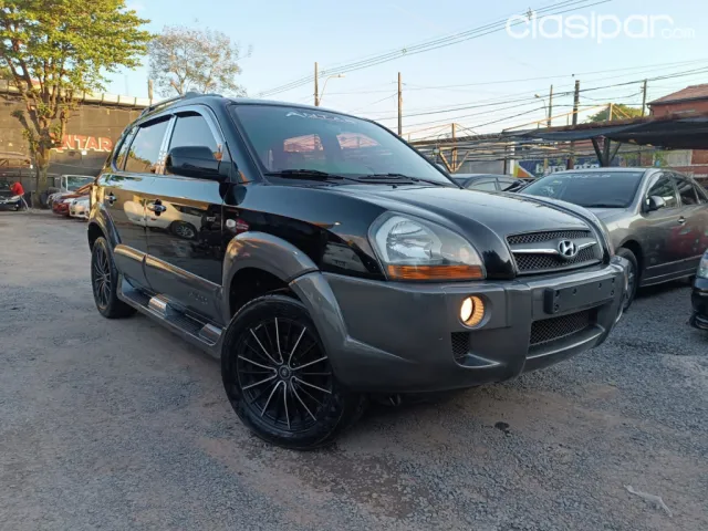Hyundai Tucson 2010 — foto 2