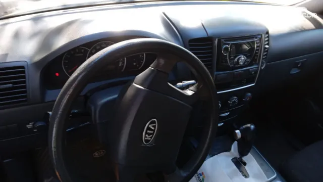 Kia Sorento 2009 — foto 2