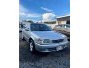 Vendo hermoso Toyota Corolla Límited Año 1999 Faro cristal Color gris Interior gris