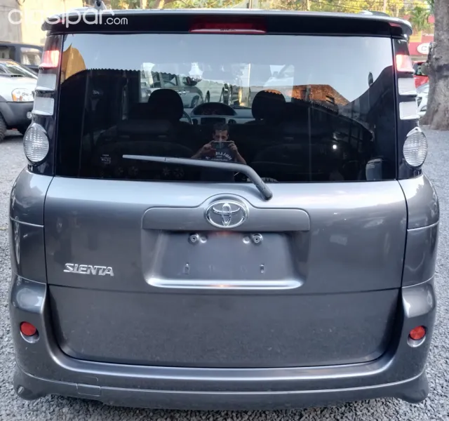 Toyota Sienta 2009 — foto 3