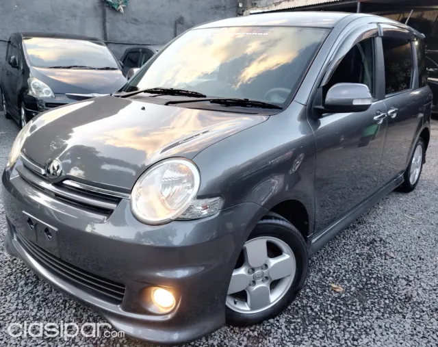 Toyota Sienta 2009 — foto 5